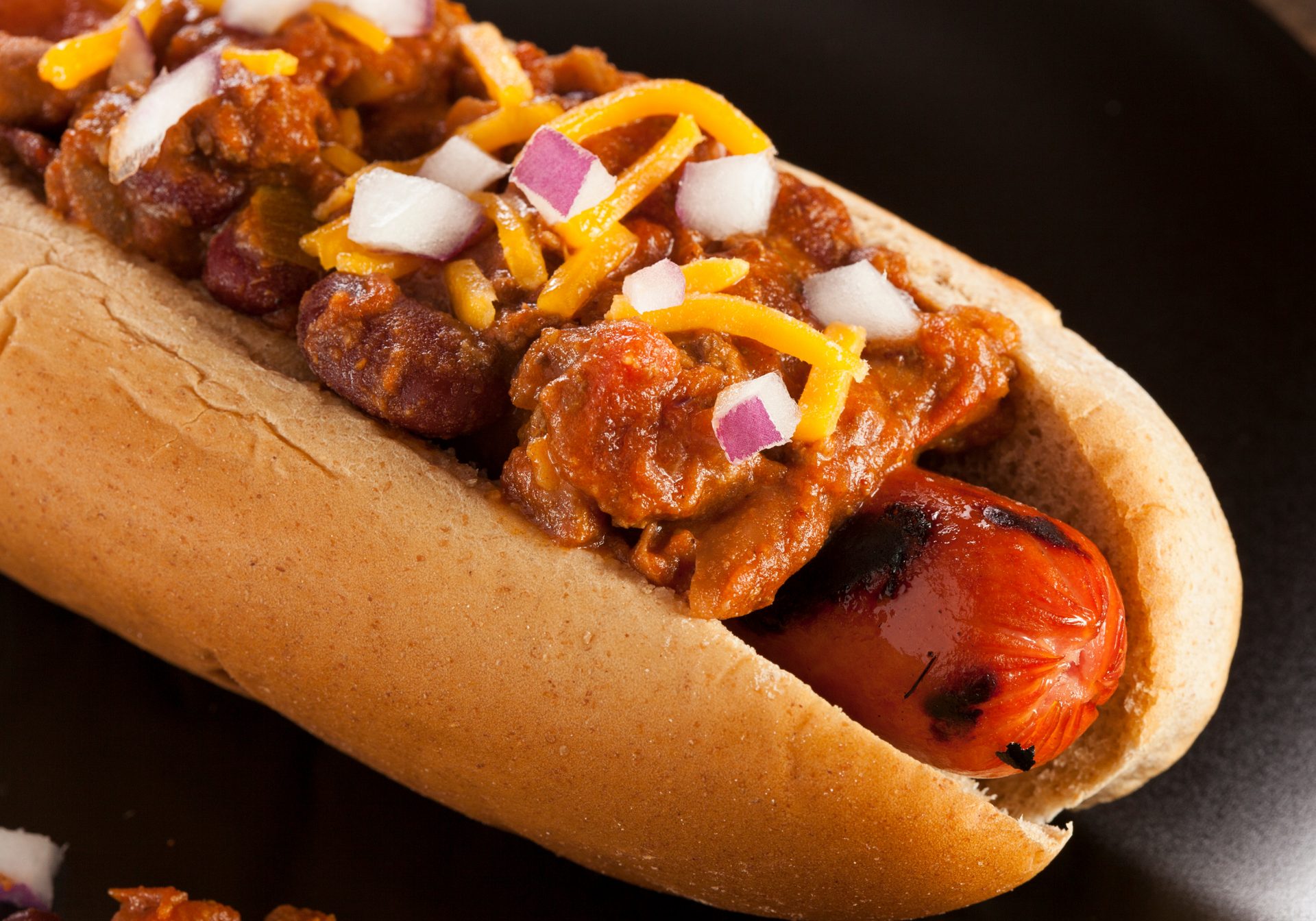 Loaded chili cheese dog with grilled onions, the Lucky Dogs Kitchen menu item of the month